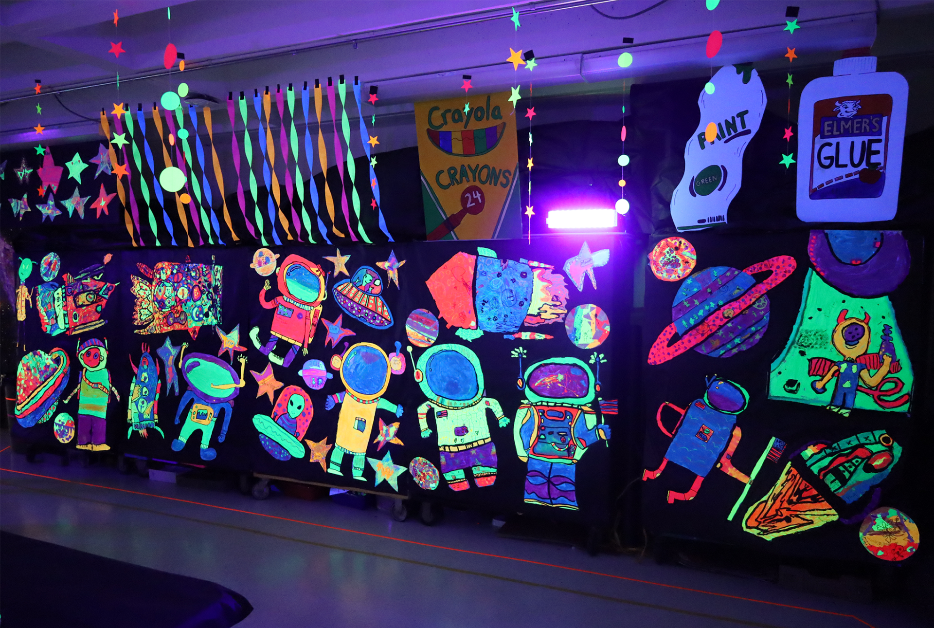 The art room was transformed into a glow-in-the-dark galaxy during Byam Elementary School's Art Night on Wednesday, May 27, 2026.