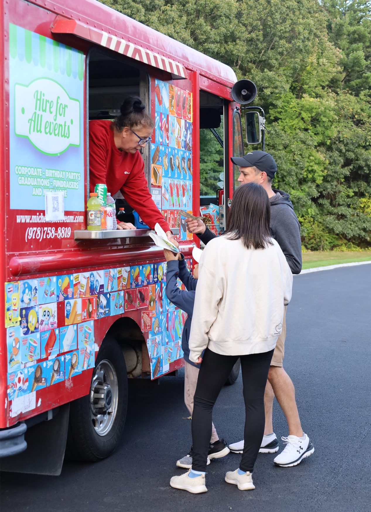 Families enjoy treats from an ice cream truck outside Byam Elementary School during the Back To School Social on Thursday, Sept. 24, 2026.