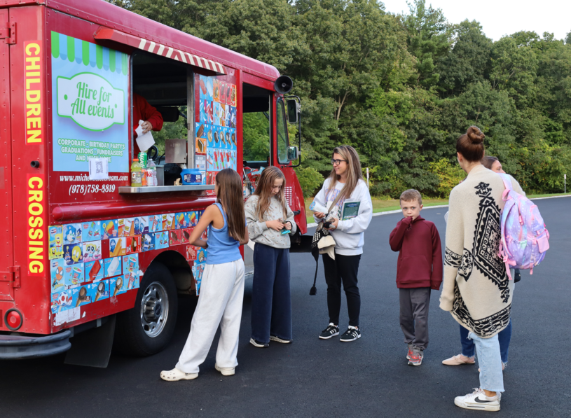 Families enjoy treats from an ice cream truck outside Byam Elementary School during the Back To School Social on Thursday, Sept. 24, 2026.
